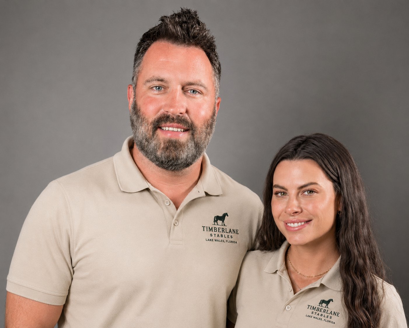 Jacob and Summer Reuter, owners of Timberlane Stables, wearing Timberlane Stables polo shirts